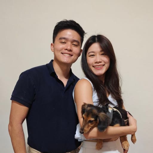 Byron and his partner with their dachshund